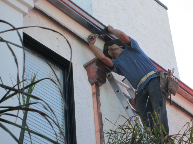 gutter installation- copper leader for downspout