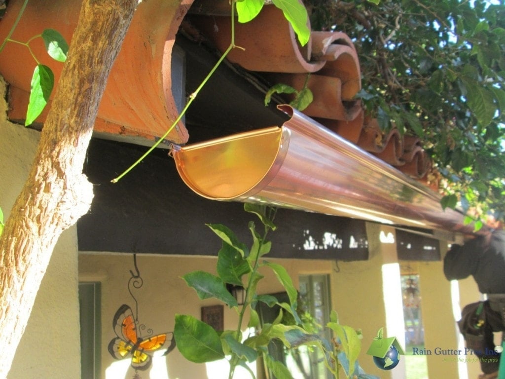 Copper half-round rain gutter installed on mission style