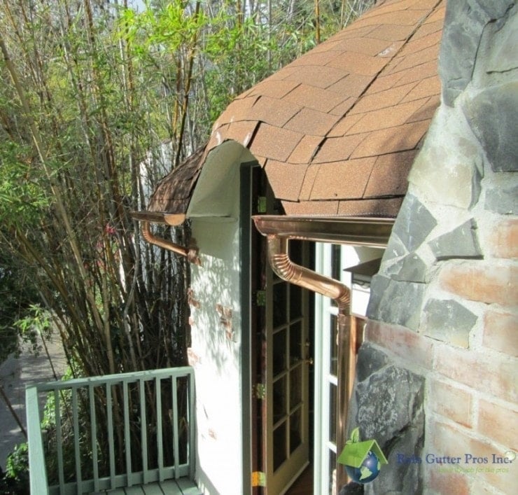 shingled roof with copper gutters