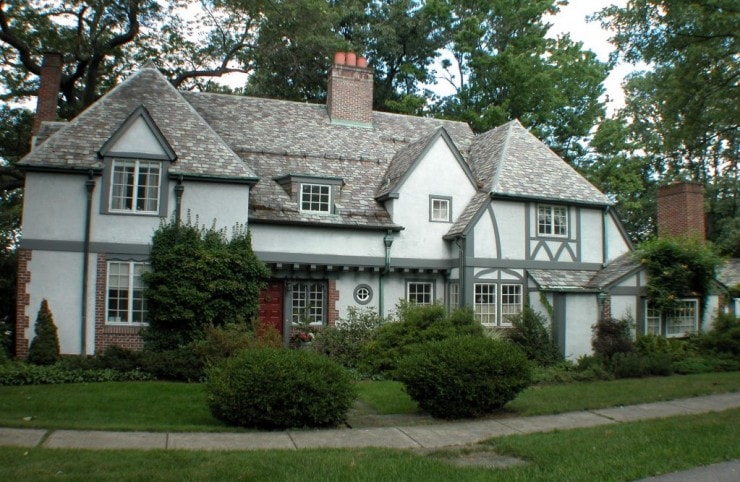 mock tudor with copper half round gutters