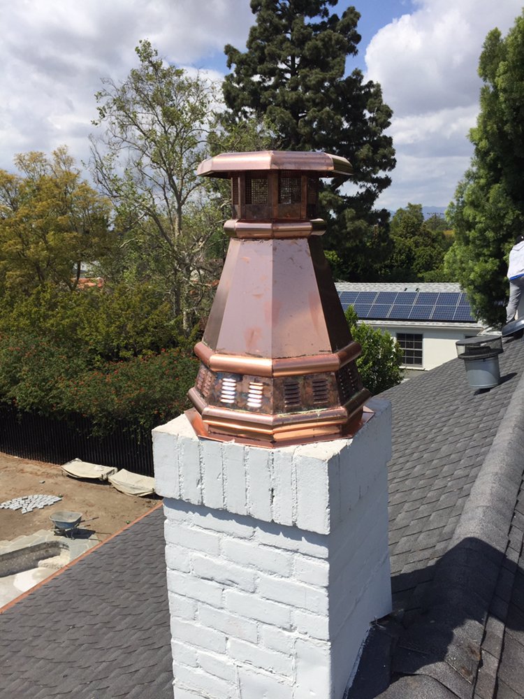 Copper chimney cap installed
